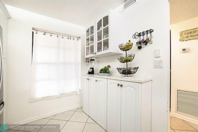CORNER UNIT!  FIRST FLOOR.  55+ Community. This beautiful 2/2 on Inverrary Country Club in Florida - for sale on GolfHomes.com, golf home, golf lot