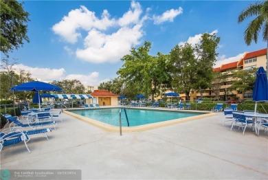 CORNER UNIT!  FIRST FLOOR.  55+ Community. This beautiful 2/2 on Inverrary Country Club in Florida - for sale on GolfHomes.com, golf home, golf lot