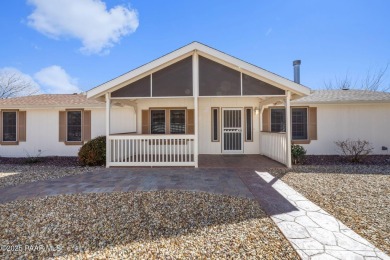 Designed for both comfort and style, this home is truly a gem on Quail Wood Greens Golf Course in Arizona - for sale on GolfHomes.com, golf home, golf lot