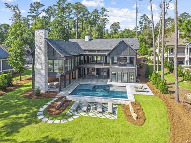 MODERN CALIFORNIA-INSPIRED LAKEFRONT RETREAT WITH POOL | Built on Harbor Club Golf and Country Club in Georgia - for sale on GolfHomes.com, golf home, golf lot