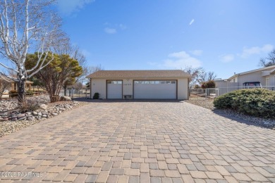 Designed for both comfort and style, this home is truly a gem on Quail Wood Greens Golf Course in Arizona - for sale on GolfHomes.com, golf home, golf lot