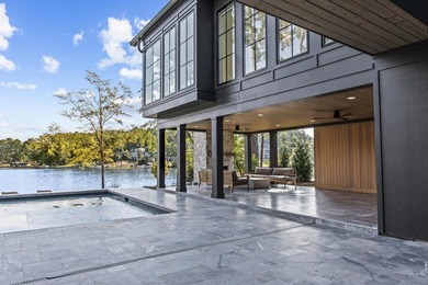 MODERN CALIFORNIA-INSPIRED LAKEFRONT RETREAT WITH POOL | Built on Harbor Club Golf and Country Club in Georgia - for sale on GolfHomes.com, golf home, golf lot