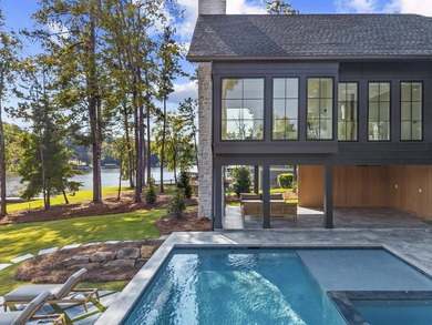MODERN CALIFORNIA-INSPIRED LAKEFRONT RETREAT WITH POOL | Built on Harbor Club Golf and Country Club in Georgia - for sale on GolfHomes.com, golf home, golf lot