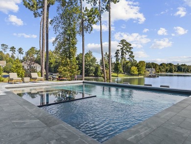 MODERN CALIFORNIA-INSPIRED LAKEFRONT RETREAT WITH POOL | Built on Harbor Club Golf and Country Club in Georgia - for sale on GolfHomes.com, golf home, golf lot
