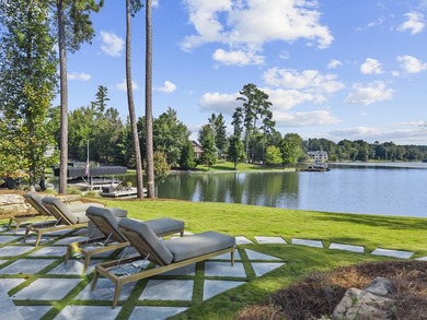 MODERN CALIFORNIA-INSPIRED LAKEFRONT RETREAT WITH POOL | Built on Harbor Club Golf and Country Club in Georgia - for sale on GolfHomes.com, golf home, golf lot