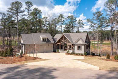 Experience refined living in this newly built custom home on Reynolds Lake Oconee - The Oconee in Georgia - for sale on GolfHomes.com, golf home, golf lot