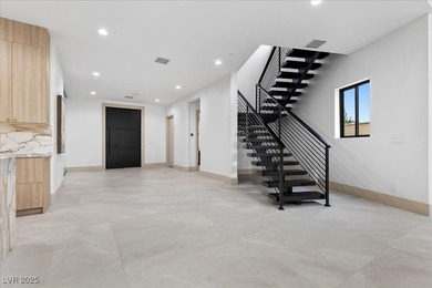 This brand-new LUXURY home in South Shore Country Club offers 5 on South Shore At Lake Las Vegas in Nevada - for sale on GolfHomes.com, golf home, golf lot