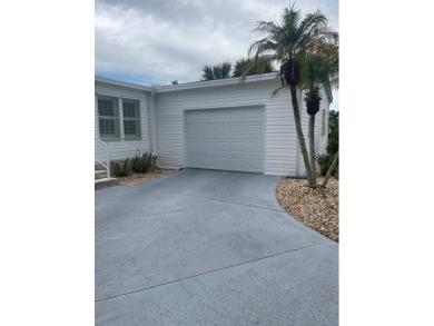 Beautiful 2-Bed, 2-Bath Home in 55+ Golf Community with Modern on Blue Heron Pines Golf Course in Florida - for sale on GolfHomes.com, golf home, golf lot