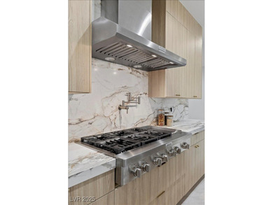 This brand-new LUXURY home in South Shore Country Club offers 5 on South Shore At Lake Las Vegas in Nevada - for sale on GolfHomes.com, golf home, golf lot