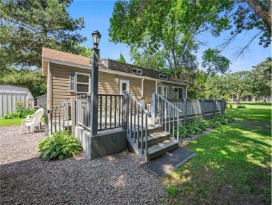 Experience seasonal living at its finest in the gated commnunity on Travelers Country Club in Minnesota - for sale on GolfHomes.com, golf home, golf lot