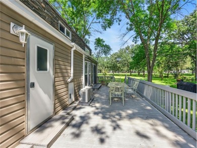 Experience seasonal living at its finest in the gated commnunity on Travelers Country Club in Minnesota - for sale on GolfHomes.com, golf home, golf lot