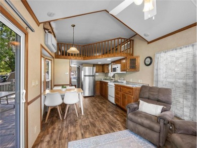 Experience seasonal living at its finest in the gated commnunity on Travelers Country Club in Minnesota - for sale on GolfHomes.com, golf home, golf lot
