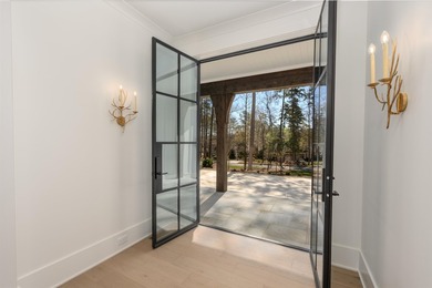 No details were missed in this stunning NEW CONSTRUCTION home on Reynolds Lake Oconee - The Oconee in Georgia - for sale on GolfHomes.com, golf home, golf lot