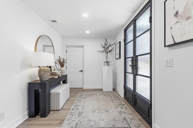 Welcome to this stunning lakefront home in the gated community on The Golf Club at Cuscowilla in Georgia - for sale on GolfHomes.com, golf home, golf lot