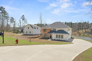 Discover this stunning new construction perched directly on on Harbor Club Golf and Country Club in Georgia - for sale on GolfHomes.com, golf home, golf lot