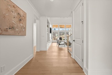 Discover this stunning new construction perched directly on on Harbor Club Golf and Country Club in Georgia - for sale on GolfHomes.com, golf home, golf lot