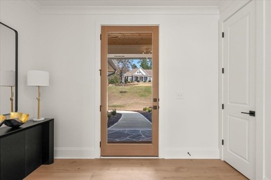 Discover this stunning new construction perched directly on on Harbor Club Golf and Country Club in Georgia - for sale on GolfHomes.com, golf home, golf lot