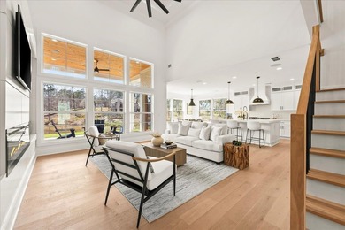 Discover this stunning new construction perched directly on on Harbor Club Golf and Country Club in Georgia - for sale on GolfHomes.com, golf home, golf lot