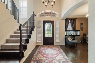 Enjoy your morning coffee on the covered patio while taking in on Ridgeview Ranch Golf Club in Texas - for sale on GolfHomes.com, golf home, golf lot