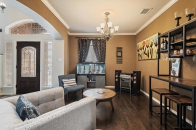 Enjoy your morning coffee on the covered patio while taking in on Ridgeview Ranch Golf Club in Texas - for sale on GolfHomes.com, golf home, golf lot