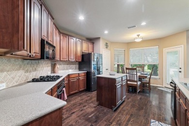 Enjoy your morning coffee on the covered patio while taking in on Ridgeview Ranch Golf Club in Texas - for sale on GolfHomes.com, golf home, golf lot