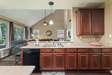 Enjoy your morning coffee on the covered patio while taking in on Ridgeview Ranch Golf Club in Texas - for sale on GolfHomes.com, golf home, golf lot