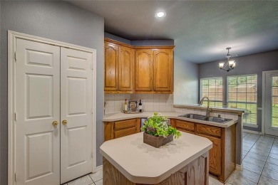 Welcome to 10801 Winged Foot Drive - A Move-In Ready Home! This on Jim Boggs in Texas - for sale on GolfHomes.com, golf home, golf lot
