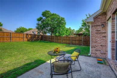 Welcome to 10801 Winged Foot Drive - A Move-In Ready Home! This on Jim Boggs in Texas - for sale on GolfHomes.com, golf home, golf lot