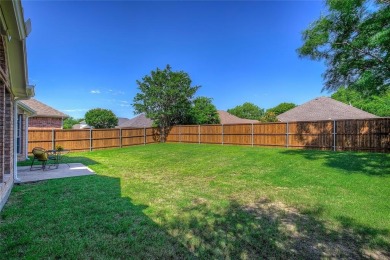 Welcome to 10801 Winged Foot Drive - A Move-In Ready Home! This on Jim Boggs in Texas - for sale on GolfHomes.com, golf home, golf lot