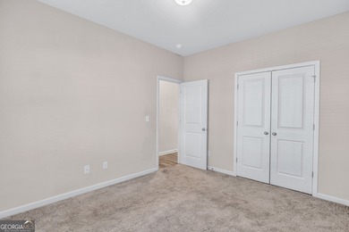 This beautifully maintained 3-bedroom, 2.5-bath townhome in the on Browns Mill Golf Course in Georgia - for sale on GolfHomes.com, golf home, golf lot