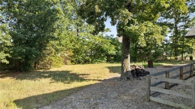 Just minutes from Hwy 49 and nestled behind Lake Loch Lomond on Bella Vista Country Club - Highlands in Arkansas - for sale on GolfHomes.com, golf home, golf lot