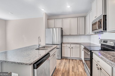 This beautifully maintained 3-bedroom, 2.5-bath townhome in the on Browns Mill Golf Course in Georgia - for sale on GolfHomes.com, golf home, golf lot