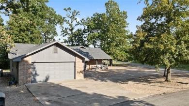 Just minutes from Hwy 49 and nestled behind Lake Loch Lomond on Bella Vista Country Club - Highlands in Arkansas - for sale on GolfHomes.com, golf home, golf lot