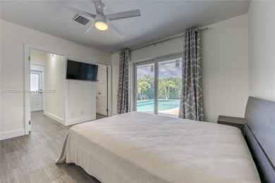 Beautiful paradise for the whole family in South Florida. Fully on Eco Golf Club in Florida - for sale on GolfHomes.com, golf home, golf lot
