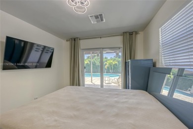 Beautiful paradise for the whole family in South Florida. Fully on Eco Golf Club in Florida - for sale on GolfHomes.com, golf home, golf lot