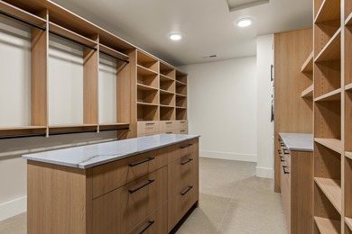 Perfectly situated among basalt rocks at the base of Snow Canyon on Entrada at Snow Canyon in Utah - for sale on GolfHomes.com, golf home, golf lot