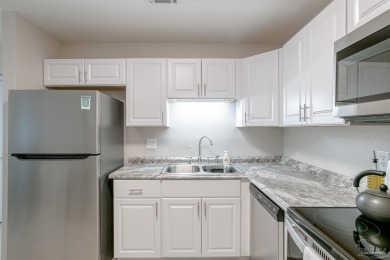 Coastal condo getaway available now for viewings! Unit has a on Tiger Point Golf and Country Club in Florida - for sale on GolfHomes.com, golf home, golf lot