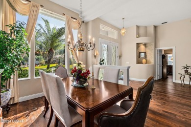 IMPECCABLE WATERFRONT POOL HOME!! Welcome to your on Plantation Bay Golf and Country Club in Florida - for sale on GolfHomes.com, golf home, golf lot