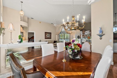 IMPECCABLE WATERFRONT POOL HOME!! Welcome to your on Plantation Bay Golf and Country Club in Florida - for sale on GolfHomes.com, golf home, golf lot