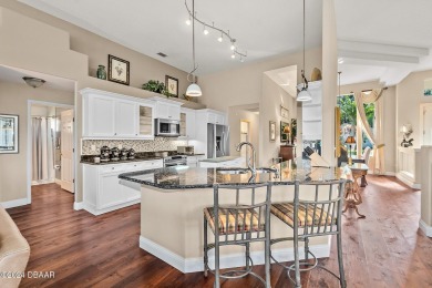 IMPECCABLE WATERFRONT POOL HOME!! Welcome to your on Plantation Bay Golf and Country Club in Florida - for sale on GolfHomes.com, golf home, golf lot