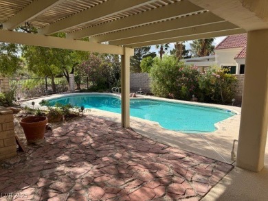 BEAUTIFUL SINGLE STORY VILLA STYLE HOME WITH GOLF FRONTAGE on Painted Desert Golf Club in Nevada - for sale on GolfHomes.com, golf home, golf lot