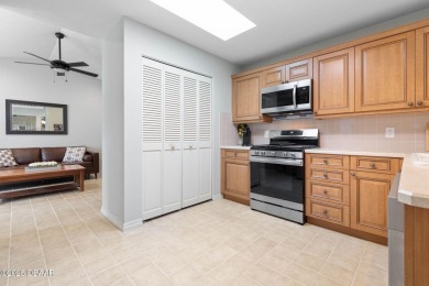 Welcome to your ideal home on Treetop Trail in the exclusive on Plantation Bay Golf and Country Club in Florida - for sale on GolfHomes.com, golf home, golf lot