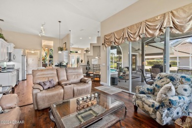 IMPECCABLE WATERFRONT POOL HOME!! Welcome to your on Plantation Bay Golf and Country Club in Florida - for sale on GolfHomes.com, golf home, golf lot