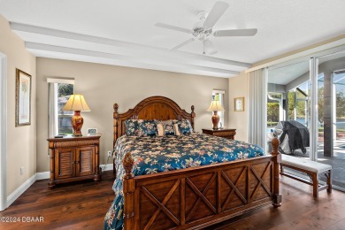 IMPECCABLE WATERFRONT POOL HOME!! Welcome to your on Plantation Bay Golf and Country Club in Florida - for sale on GolfHomes.com, golf home, golf lot