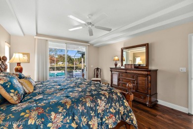 IMPECCABLE WATERFRONT POOL HOME!! Welcome to your on Plantation Bay Golf and Country Club in Florida - for sale on GolfHomes.com, golf home, golf lot