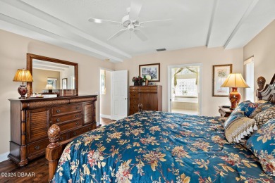 IMPECCABLE WATERFRONT POOL HOME!! Welcome to your on Plantation Bay Golf and Country Club in Florida - for sale on GolfHomes.com, golf home, golf lot