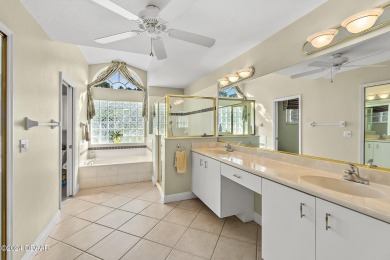 IMPECCABLE WATERFRONT POOL HOME!! Welcome to your on Plantation Bay Golf and Country Club in Florida - for sale on GolfHomes.com, golf home, golf lot