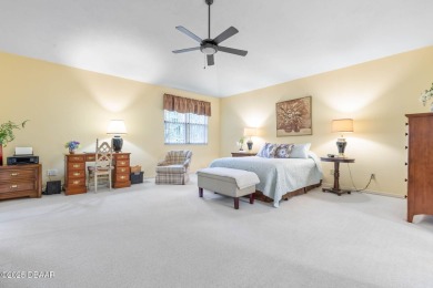 Welcome to your ideal home on Treetop Trail in the exclusive on Plantation Bay Golf and Country Club in Florida - for sale on GolfHomes.com, golf home, golf lot