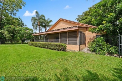 Welcome to the Oak Knoll Ridge neighborhood of Davie. This on Pine Island Ridge Country Club in Florida - for sale on GolfHomes.com, golf home, golf lot