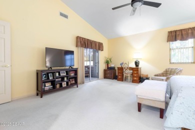 Welcome to your ideal home on Treetop Trail in the exclusive on Plantation Bay Golf and Country Club in Florida - for sale on GolfHomes.com, golf home, golf lot